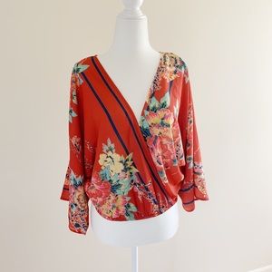 Red v-neck kimono style vacation top